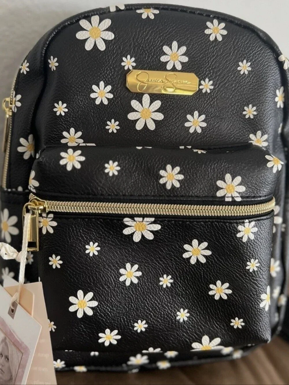 NWT-Jessica Simpson Black Daisy Mini Backpack W/ Gold Hardware Plus 2 Charms.